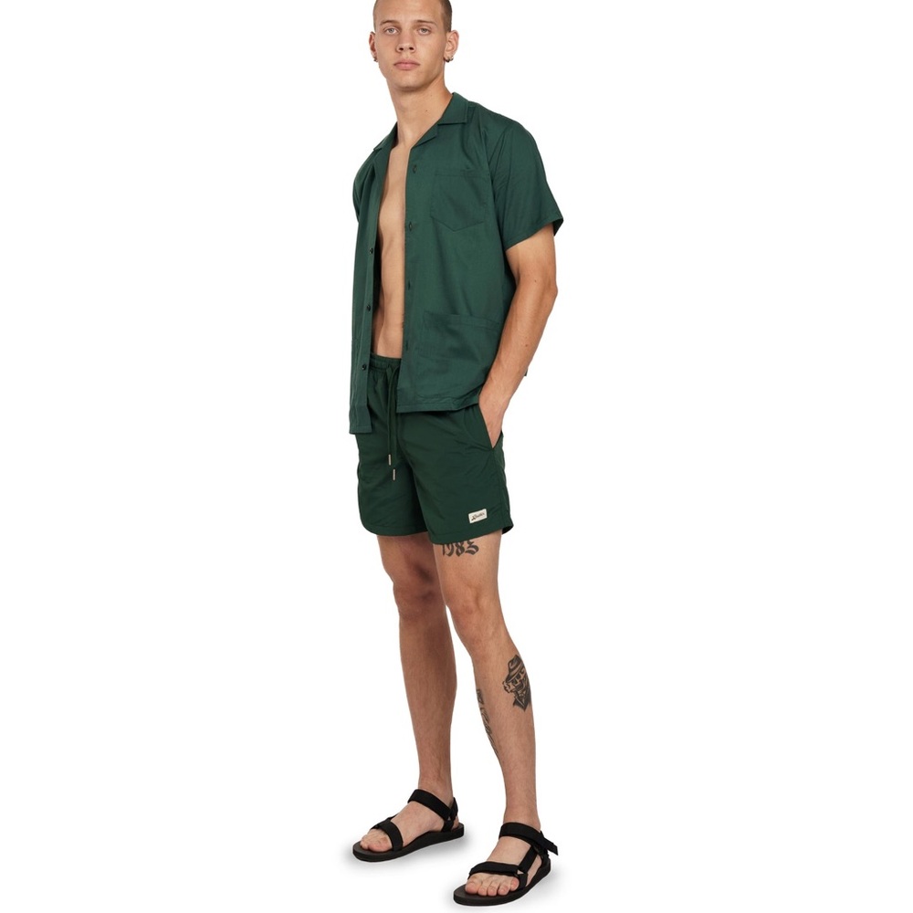 BATHER SOLID PINE SWIM TRUNK